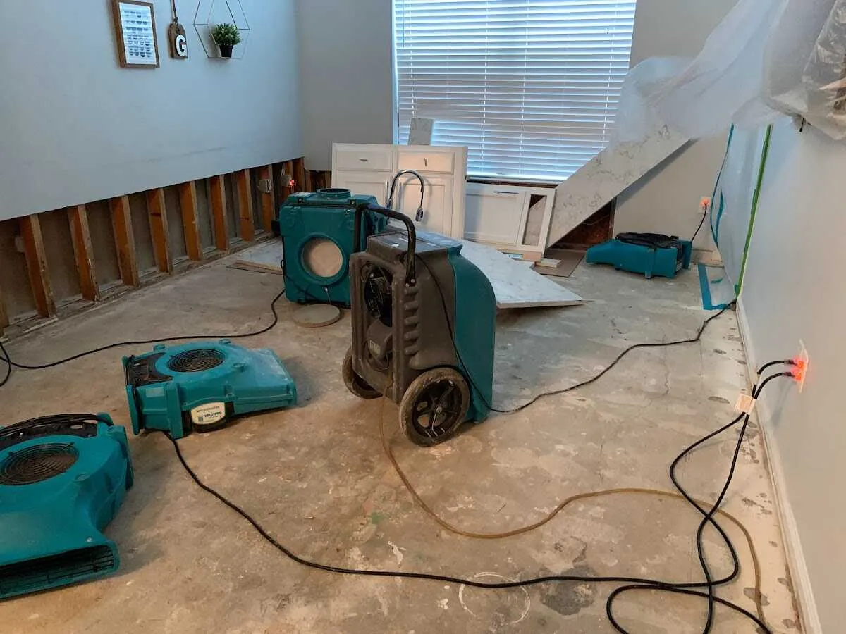 Dehumidifier in flood-cut room for Water Damage Restoration in Itasca